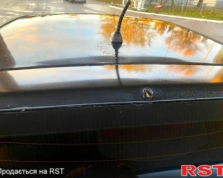 Чорний Кіа Ріо, об'ємом двигуна 1.4 л та пробігом 160 тис. км за 3900 $, фото 5 на Automoto.ua