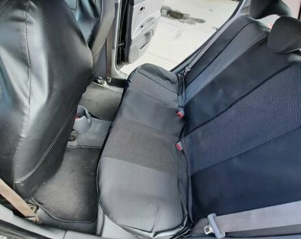 Черный Киа Рио, объемом двигателя 1.4 л и пробегом 222 тыс. км за 4100 $, фото 9 на Automoto.ua