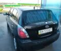 Черный Киа Рио, объемом двигателя 1.4 л и пробегом 349 тыс. км за 2599 $, фото 12 на Automoto.ua