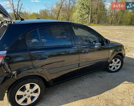 Черный Киа Рио, объемом двигателя 1.4 л и пробегом 103 тыс. км за 3400 $, фото 7 на Automoto.ua