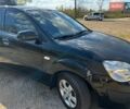 Черный Киа Рио, объемом двигателя 1.4 л и пробегом 103 тыс. км за 3400 $, фото 6 на Automoto.ua
