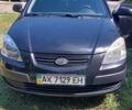 Чорний Кіа Ріо, об'ємом двигуна 1.4 л та пробігом 235 тис. км за 3300 $, фото 1 на Automoto.ua