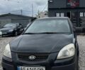 Черный Киа Рио, объемом двигателя 1.4 л и пробегом 30 тыс. км за 2900 $, фото 1 на Automoto.ua