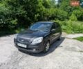 Черный Киа Рио, объемом двигателя 1.4 л и пробегом 356 тыс. км за 2400 $, фото 1 на Automoto.ua