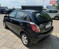 Чорний Кіа Ріо, об'ємом двигуна 1.4 л та пробігом 180 тис. км за 5999 $, фото 3 на Automoto.ua