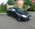 Черный Киа Рио, объемом двигателя 1.4 л и пробегом 216 тыс. км за 3700 $, фото 7 на Automoto.ua