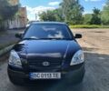 Чорний Кіа Ріо, об'ємом двигуна 1.4 л та пробігом 240 тис. км за 3711 $, фото 1 на Automoto.ua