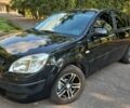 Черный Киа Рио, объемом двигателя 1.6 л и пробегом 180 тыс. км за 4999 $, фото 2 на Automoto.ua