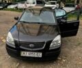 Чорний Кіа Ріо, об'ємом двигуна 1.4 л та пробігом 204 тис. км за 3888 $, фото 2 на Automoto.ua