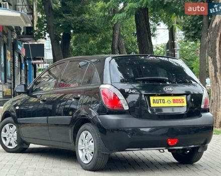 Чорний Кіа Ріо, об'ємом двигуна 1.4 л та пробігом 260 тис. км за 4800 $, фото 6 на Automoto.ua