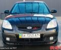 Черный Киа Рио, объемом двигателя 1.4 л и пробегом 349 тыс. км за 2599 $, фото 1 на Automoto.ua