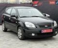 Черный Киа Рио, объемом двигателя 1.4 л и пробегом 166 тыс. км за 6000 $, фото 3 на Automoto.ua