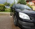 Черный Киа Рио, объемом двигателя 1.4 л и пробегом 216 тыс. км за 3700 $, фото 2 на Automoto.ua