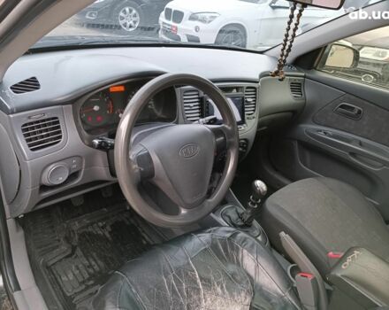 Черный Киа Рио, объемом двигателя 1.4 л и пробегом 274 тыс. км за 5290 $, фото 12 на Automoto.ua