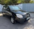 Чорний Кіа Ріо, об'ємом двигуна 1.4 л та пробігом 160 тис. км за 5494 $, фото 16 на Automoto.ua