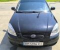 Черный Киа Рио, объемом двигателя 1.6 л и пробегом 170 тыс. км за 5000 $, фото 1 на Automoto.ua