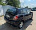Чорний Кіа Ріо, об'ємом двигуна 1.4 л та пробігом 180 тис. км за 6036 $, фото 3 на Automoto.ua