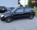 Чорний Кіа Ріо, об'ємом двигуна 1.4 л та пробігом 216 тис. км за 4500 $, фото 18 на Automoto.ua