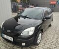 Черный Киа Рио, объемом двигателя 1.4 л и пробегом 230 тыс. км за 3600 $, фото 1 на Automoto.ua