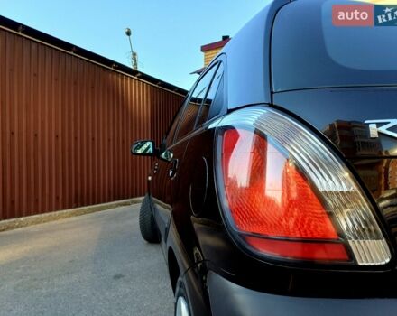 Черный Киа Рио, объемом двигателя 1.4 л и пробегом 212 тыс. км за 4400 $, фото 7 на Automoto.ua