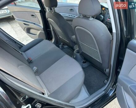 Черный Киа Рио, объемом двигателя 1.4 л и пробегом 167 тыс. км за 5200 $, фото 9 на Automoto.ua