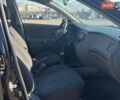 Черный Киа Рио, объемом двигателя 1.4 л и пробегом 167 тыс. км за 4200 $, фото 5 на Automoto.ua