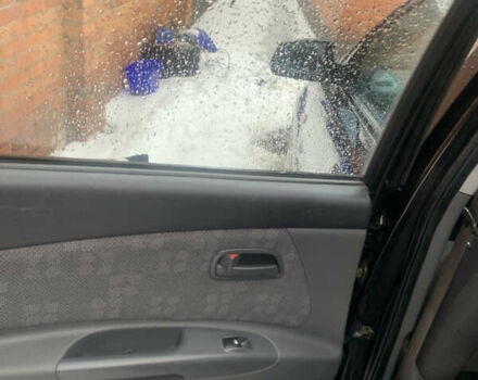 Черный Киа Рио, объемом двигателя 1.4 л и пробегом 86 тыс. км за 5300 $, фото 8 на Automoto.ua