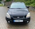 Чорний Кіа Ріо, об'ємом двигуна 1.49 л та пробігом 241 тис. км за 4150 $, фото 4 на Automoto.ua