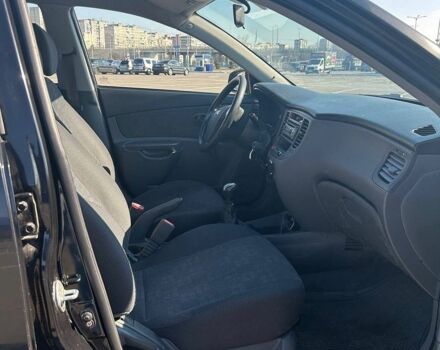 Чорний Кіа Ріо, об'ємом двигуна 1.4 л та пробігом 167 тис. км за 2900 $, фото 5 на Automoto.ua