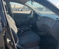 Чорний Кіа Ріо, об'ємом двигуна 1.4 л та пробігом 167 тис. км за 2900 $, фото 5 на Automoto.ua