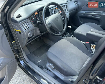 Чорний Кіа Ріо, об'ємом двигуна 1.4 л та пробігом 166 тис. км за 6100 $, фото 12 на Automoto.ua