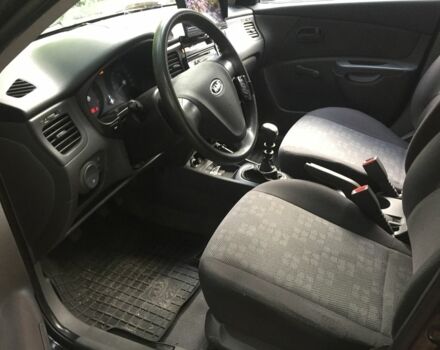 Чорний Кіа Ріо, об'ємом двигуна 1.4 л та пробігом 204 тис. км за 3888 $, фото 9 на Automoto.ua