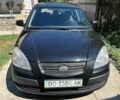 Черный Киа Рио, объемом двигателя 1.4 л и пробегом 214 тыс. км за 5100 $, фото 15 на Automoto.ua