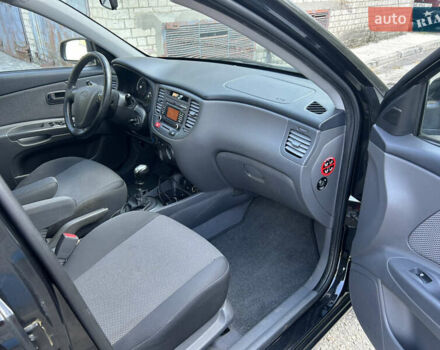 Чорний Кіа Ріо, об'ємом двигуна 1.4 л та пробігом 166 тис. км за 6100 $, фото 11 на Automoto.ua