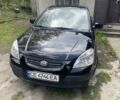 Черный Киа Рио, объемом двигателя 1.4 л и пробегом 260 тыс. км за 3950 $, фото 1 на Automoto.ua