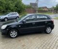 Чорний Кіа Ріо, об'ємом двигуна 1.5 л та пробігом 241 тис. км за 4350 $, фото 2 на Automoto.ua
