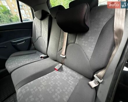 Черный Киа Рио, объемом двигателя 1.4 л и пробегом 270 тыс. км за 5100 $, фото 10 на Automoto.ua