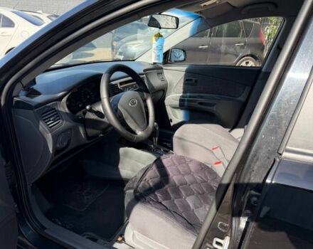 Чорний Кіа Ріо, об'ємом двигуна 1.4 л та пробігом 160 тис. км за 5494 $, фото 6 на Automoto.ua