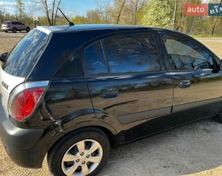 Черный Киа Рио, объемом двигателя 1.4 л и пробегом 103 тыс. км за 3400 $, фото 1 на Automoto.ua