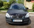 Черный Киа Рио, объемом двигателя 1.4 л и пробегом 216 тыс. км за 3700 $, фото 8 на Automoto.ua