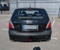 Черный Киа Рио, объемом двигателя 1.4 л и пробегом 287 тыс. км за 4400 $, фото 2 на Automoto.ua