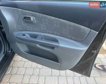 Черный Киа Рио, объемом двигателя 1.4 л и пробегом 102 тыс. км за 4499 $, фото 37 на Automoto.ua