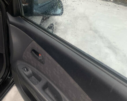 Черный Киа Рио, объемом двигателя 1.4 л и пробегом 86 тыс. км за 5300 $, фото 9 на Automoto.ua