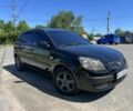 Черный Киа Рио, объемом двигателя 1.4 л и пробегом 240 тыс. км за 5200 $, фото 1 на Automoto.ua