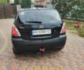 Черный Киа Рио, объемом двигателя 1.4 л и пробегом 160 тыс. км за 4250 $, фото 3 на Automoto.ua