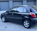 Черный Киа Рио, объемом двигателя 1.4 л и пробегом 111 тыс. км за 4999 $, фото 6 на Automoto.ua