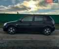 Черный Киа Рио, объемом двигателя 1.4 л и пробегом 220 тыс. км за 4399 $, фото 4 на Automoto.ua