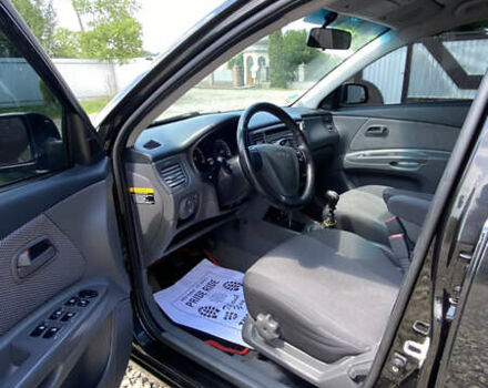 Чорний Кіа Ріо, об'ємом двигуна 1.4 л та пробігом 207 тис. км за 4199 $, фото 2 на Automoto.ua