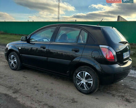 Чорний Кіа Ріо, об'ємом двигуна 1.4 л та пробігом 220 тис. км за 4399 $, фото 6 на Automoto.ua