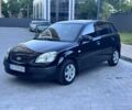 Черный Киа Рио, объемом двигателя 1.4 л и пробегом 111 тыс. км за 4999 $, фото 1 на Automoto.ua